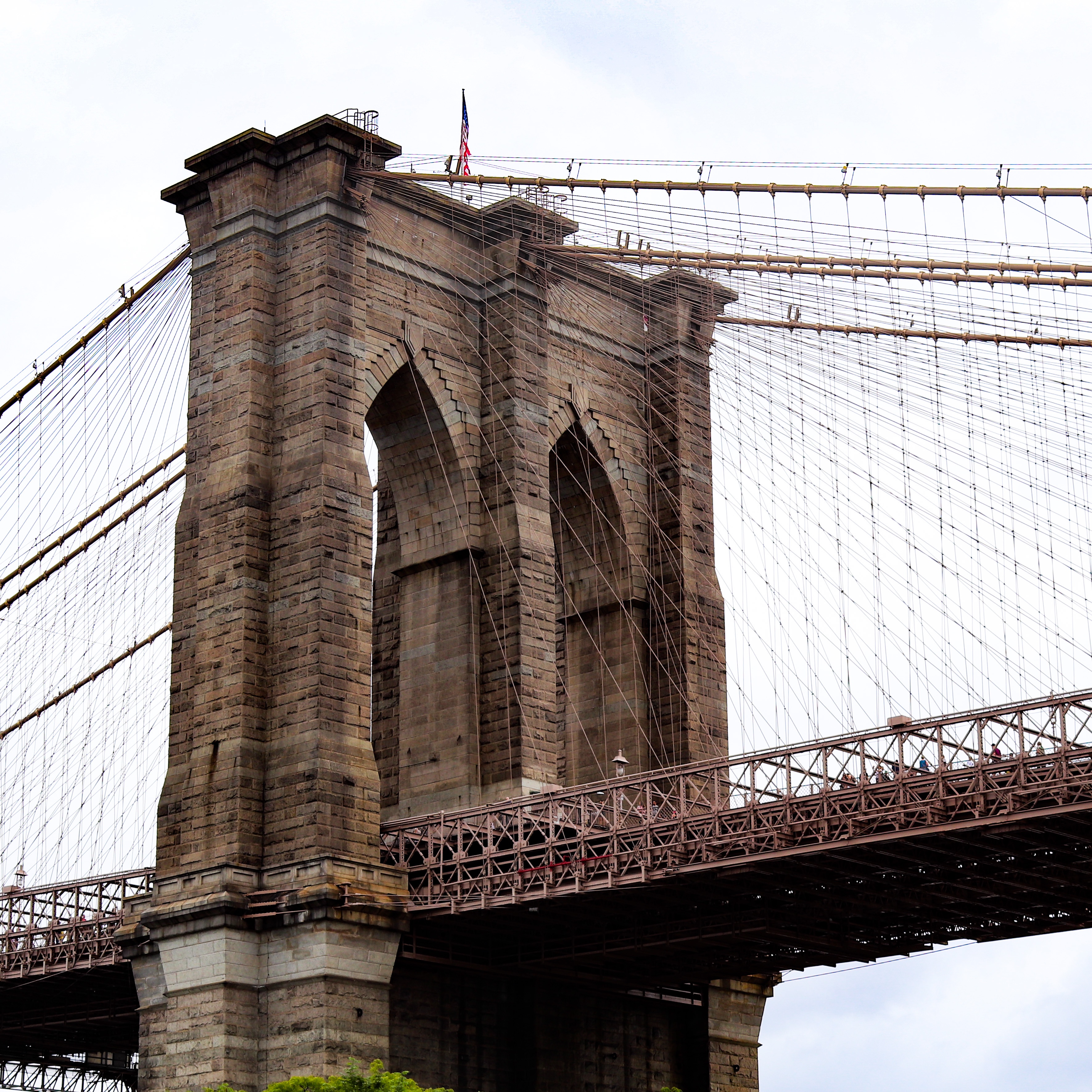 A view of Brooklyn Bridge's eastern pillar taken from the Brookyln Bridge Park.