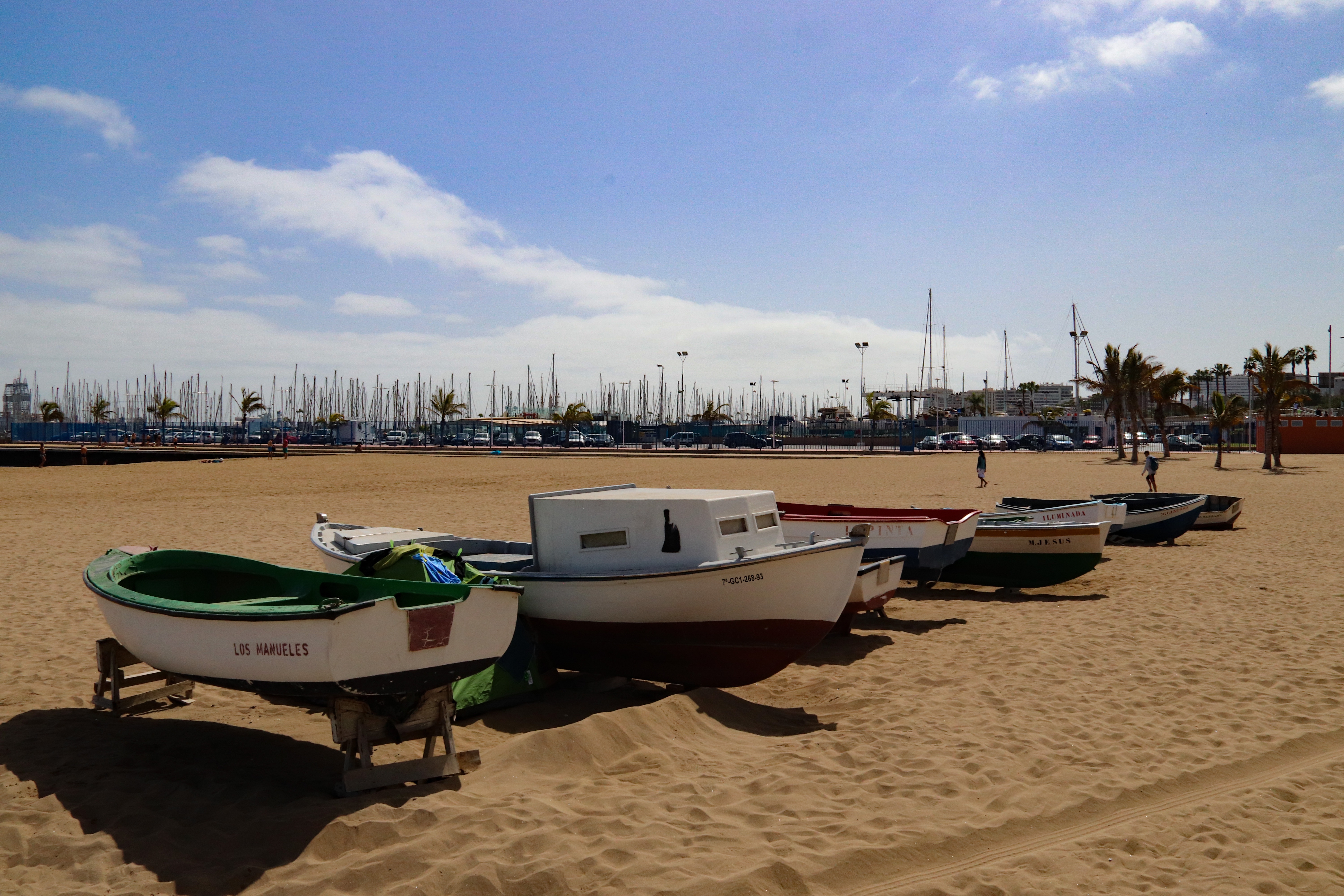 Small fashing boats lined up along the beach in Las Palmas. 