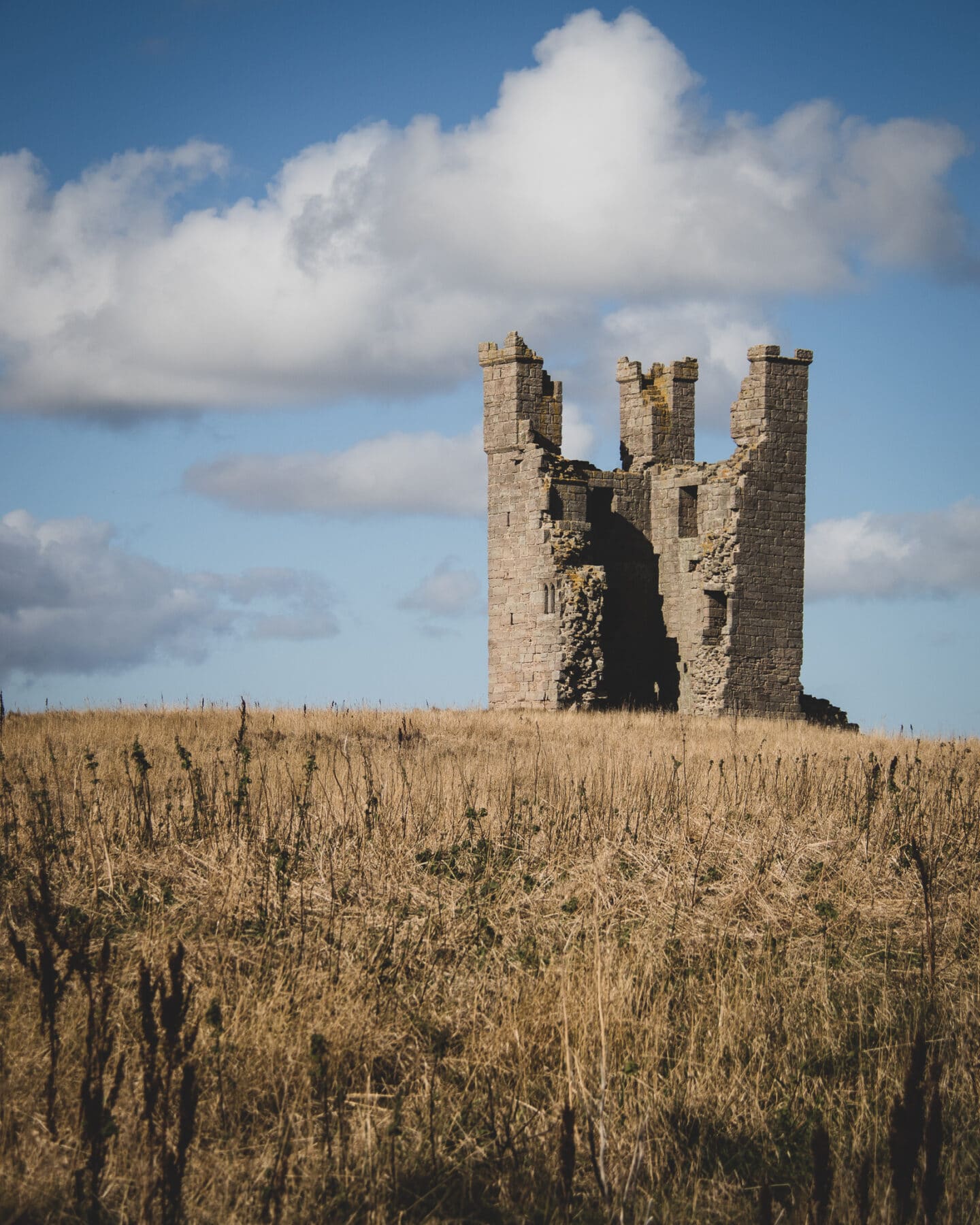 A view of Dunstanburgh Castle's crumbling Lilburn tower. 